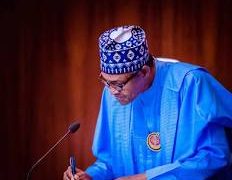 President Buhari finally signs PIB into law