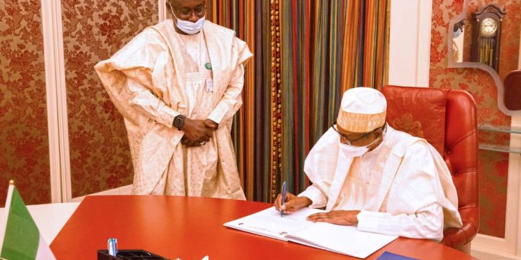 Buhari, Osinbajo sign pledge card to end open defecation in Nigeria by 2025